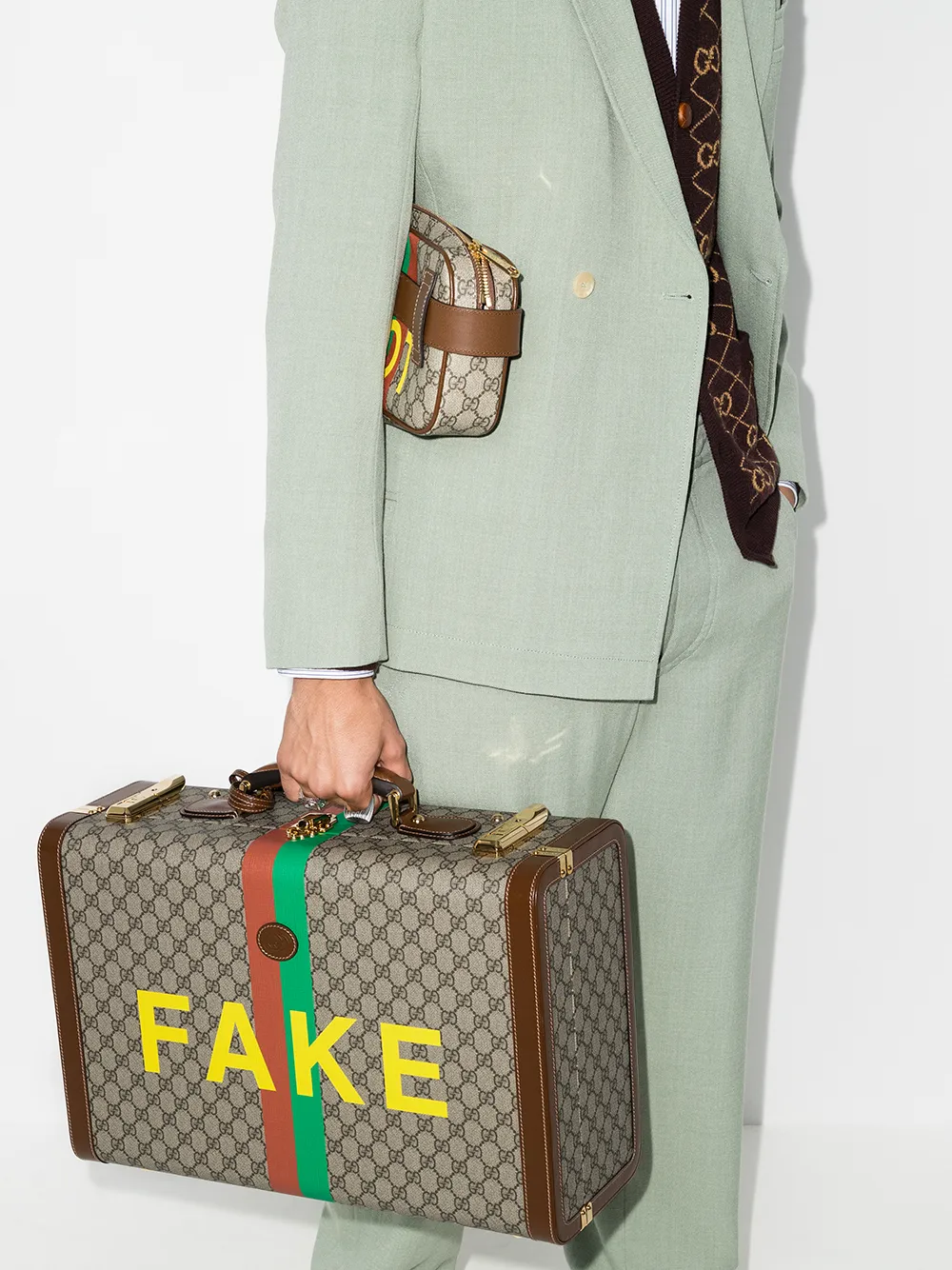 gucci suitcase fake