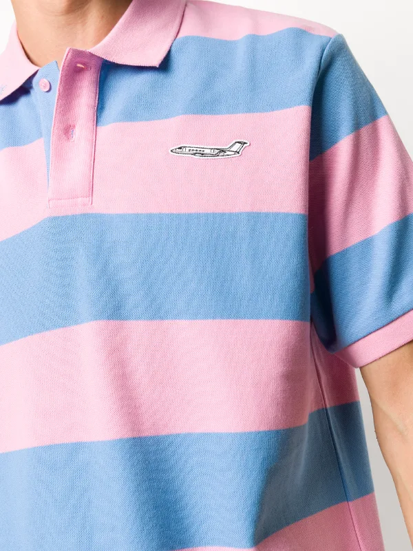 pink and blue striped polo shirt