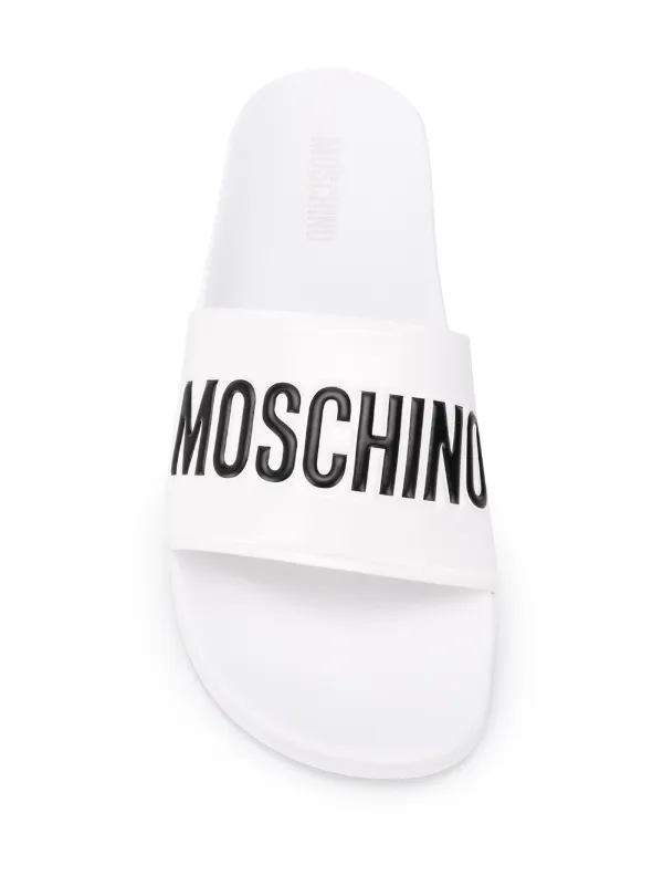 white moschino slides