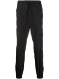 Marcelo Burlon County of Milan Cross tapered track pants - Black