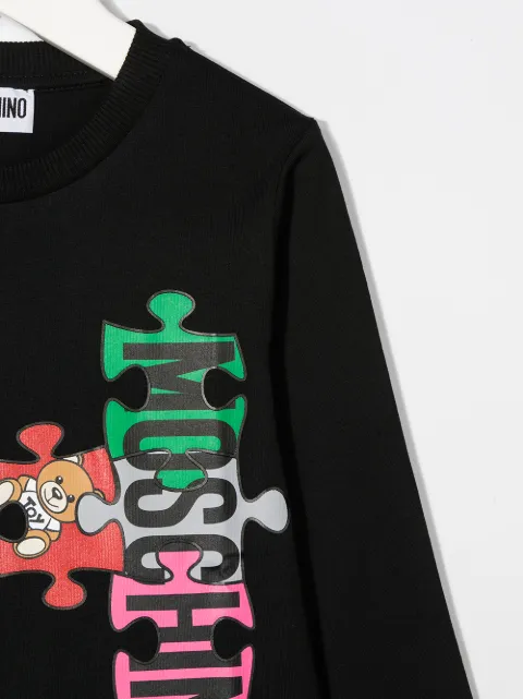 Shop Moschino Kids logo puzzle-print T 