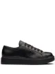 Image 1 of Prada logo embossed low-top sneakers