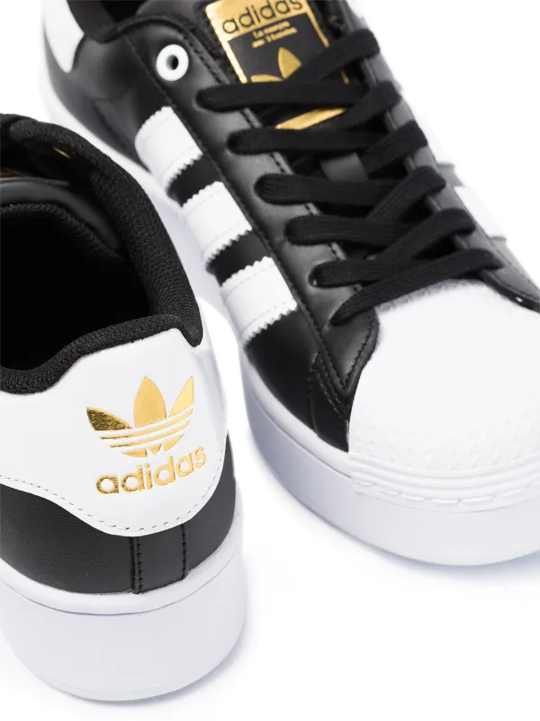 black and white low top adidas