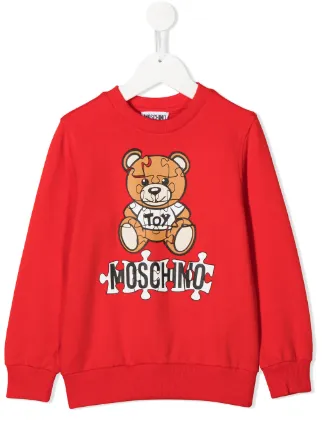 Shop red Moschino Kids puzzle bear 