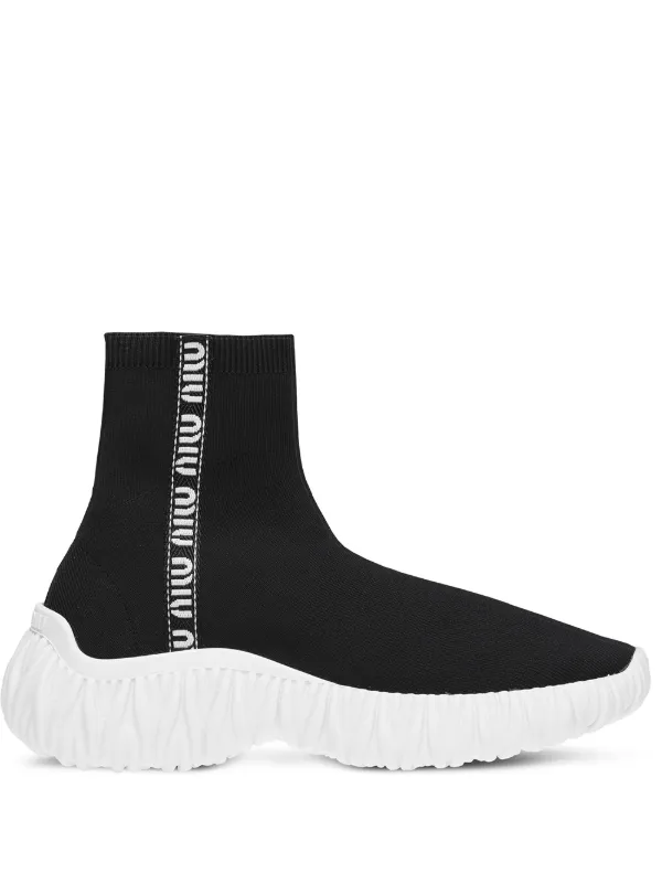 black slip on high top sneakers