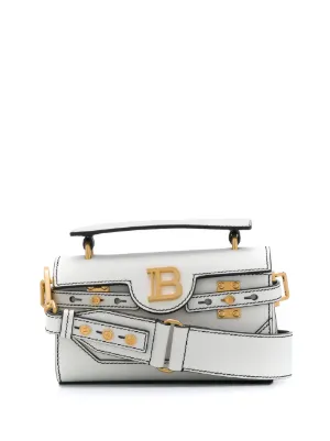 B-Buzz 18 baguette bag by Balmain, available on farfetch.com for $1528 Lucy Hale Bags SIMILAR PRODUCT