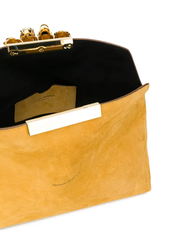 yellow suede clutch bag