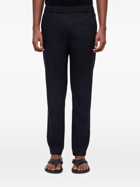 Osklen pantalones rectos con pretina elástica