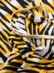 Reina Olga open-back tiger print swimsuit