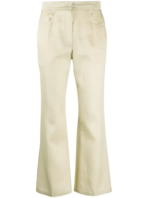 flared beige trousers