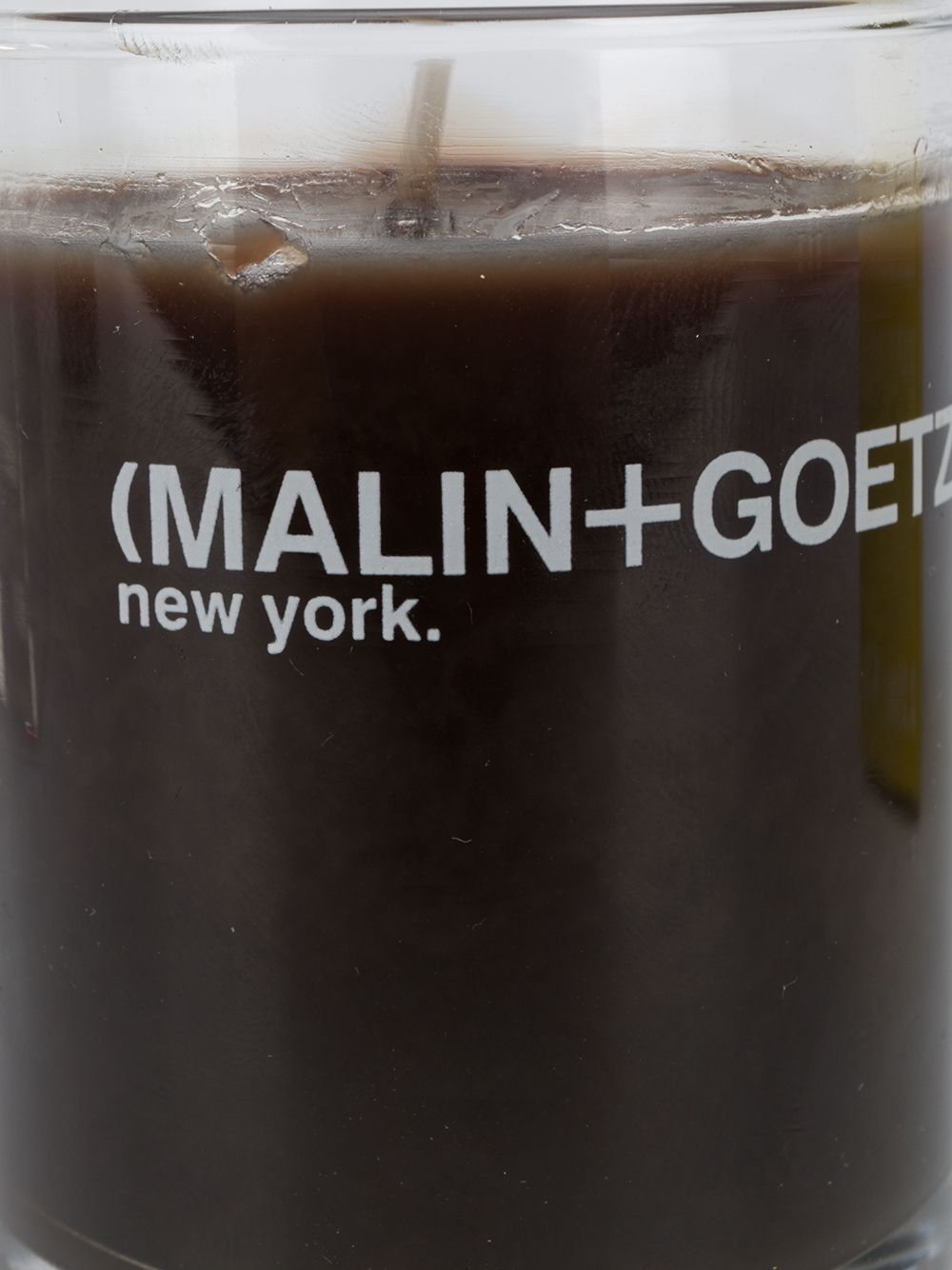 фото Malin+goetz dark rum votive candle