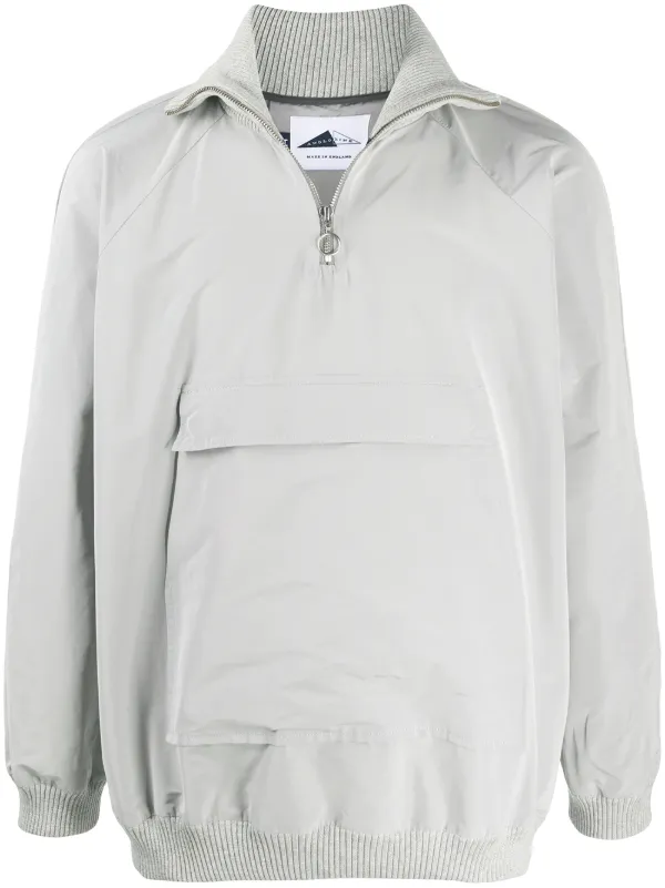 white half zip windbreaker