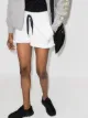 Imagem 2 de adidas by Stella McCartney Bermuda esportiva com estampa de logo