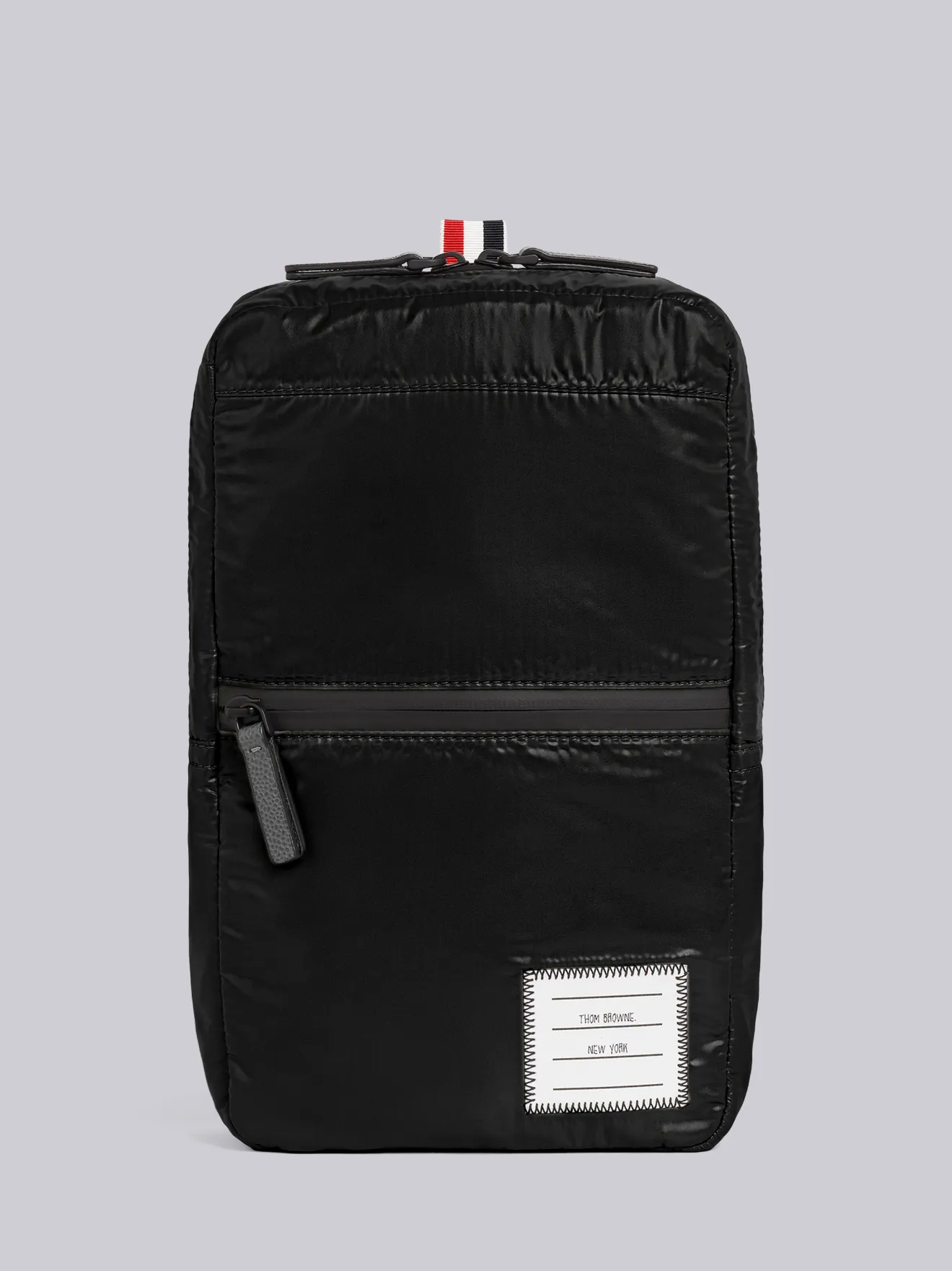 logo-patch crossbody backpack | Thom 