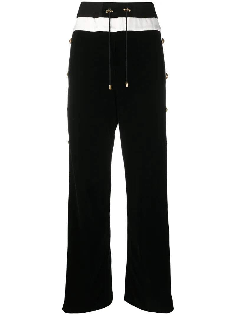 Click to view more detailed imagery on our partner's website Balmain Buttoned Wide-leg Trousers In Black