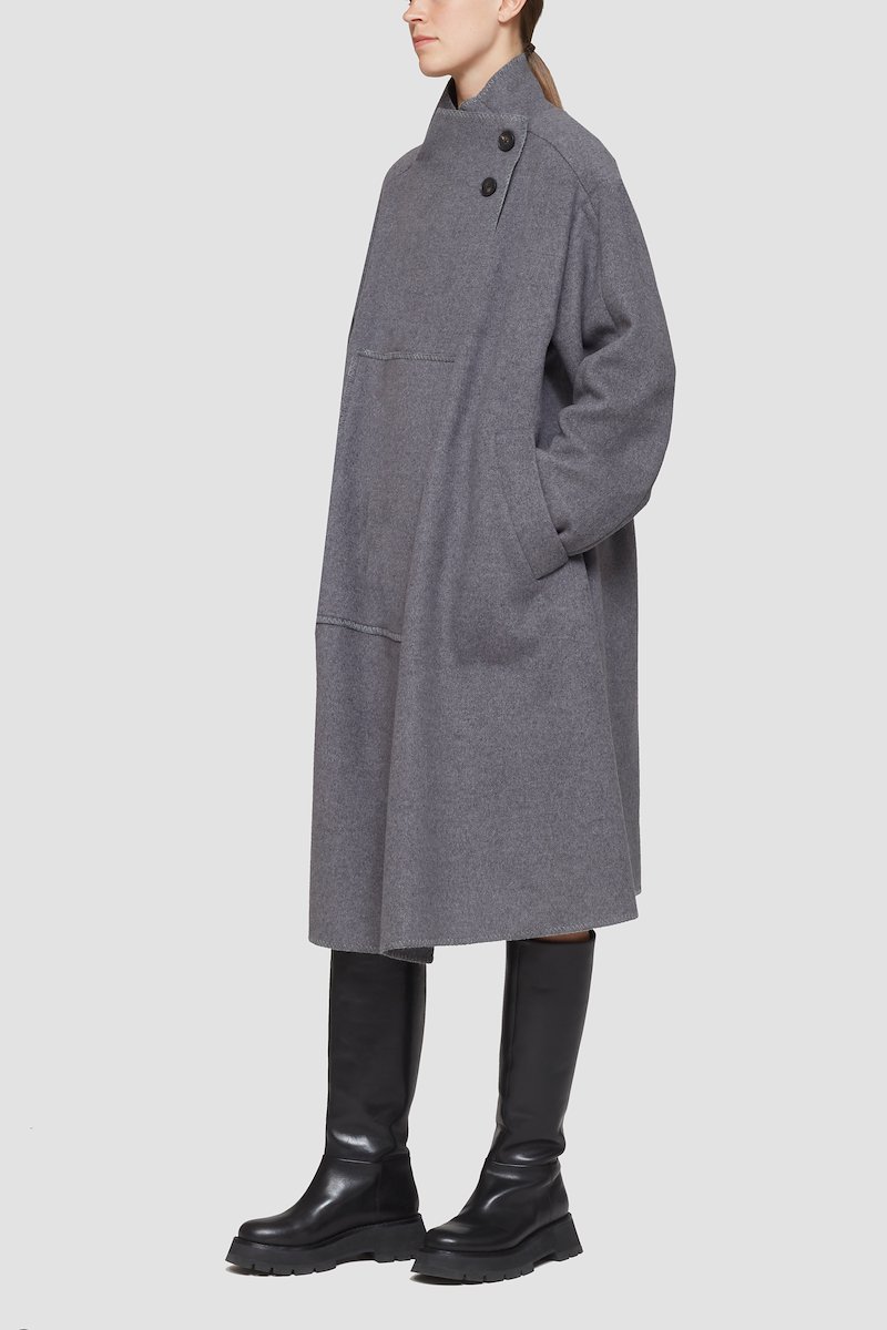 Melton Wool Blend Blanket Coat-grey #1 Melton Wool Blend Blanket Coat, Charcoal grey recycled wool-Tencel™ blend wrap blanket coat from 3.1 PHILLIP LIM featuring high neck, off-centre front button fastening, patch detail, drop shoulder, long sleeves, side slits, central rear vent and oversized style. POSITIVELY CONSCIOUS: At least 50% of the main material of this product meets our conscious criteria. For example, it's either organic, recycled, upcycled or independently recognised as being better for the environment (such as linen, ramie, TENCEL™ etc.)..- 3