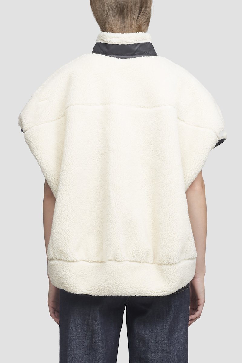 Sherpa Bonded Cocoon Vest-white #0 Sherpa Bonded Cocoon Vest, Ivory white/black sherpa bonded cocoon vest from 3.1 PHILLIP LIM featuring stand-up collar, cap sleeves, tonal stitching, front zip fastening, front zip fastening pockets and curved hem.- 2
