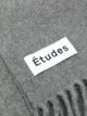 Etudes knitted fringed-edge scarf