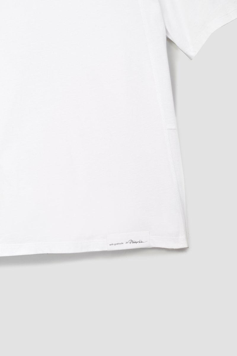 The Boxy Tee-white #1 The Boxy Tee, Optic white cotton blend Essential T-shirt from 3.1 PHILLIP LIM featuring patchwork design, logo patch to the front, round neck, short sleeves and straight hem.- 7