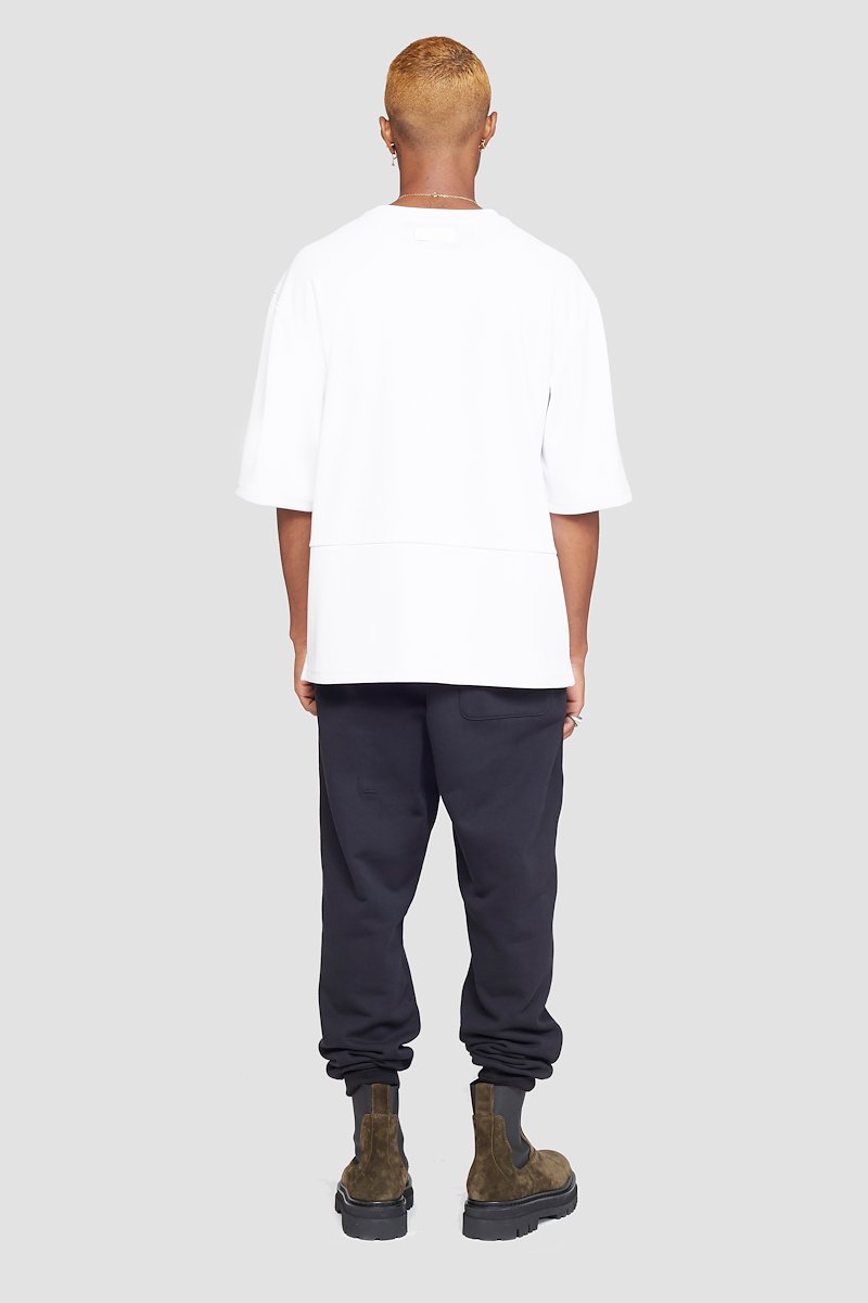 The Boxy Tee, Optic white cotton blend Essential T-shirt from 3.1 PHILLIP LIM featuring patchwork design, logo patch to the front, round neck, short sleeves and straight hem.- 2