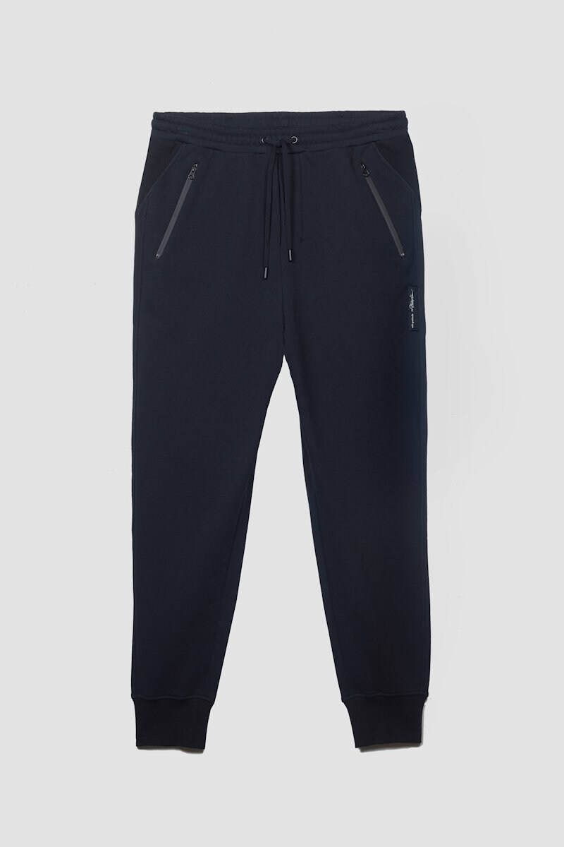 The Everyday Jogger, Black cotton Everyday cotton track pants from 3.1 PHILLIP LIM featuring mid-rise, elasticated drawstring waistband, two side zip-fastening pockets, rear patch pocket and ribbed cuffs.- 4