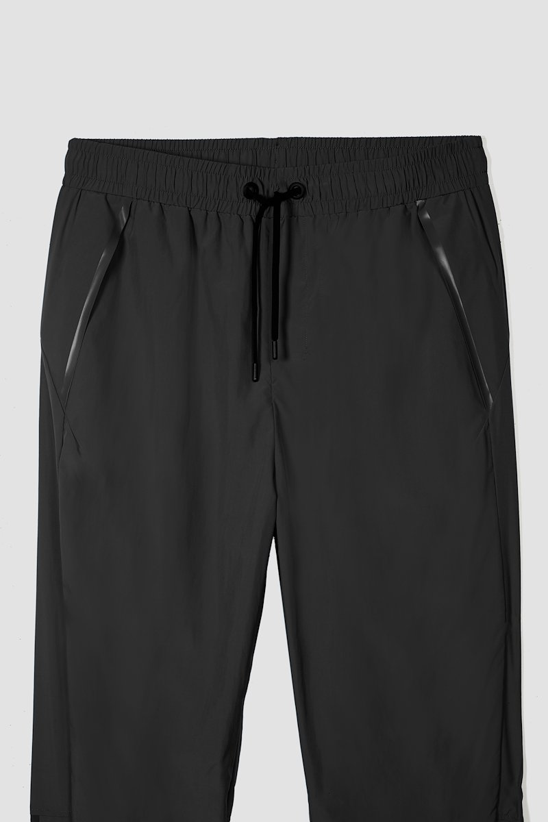 The Track-Less Pants-black #0 The Track-Less Pants, Black Track-Less pants from 3.1 PHILLIP LIM featuring tapered leg, elasticated drawstring waistband, two side slit pockets, rear welt pocket, zip details and elasticated ankles.- 6