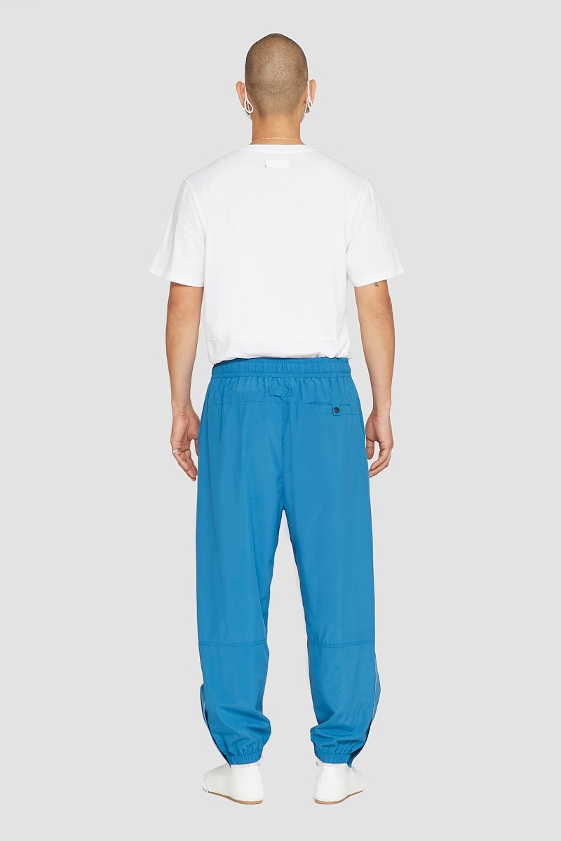 The Track-Less Pant-blue #0 The Track-Less Pant, Peacock blue Track-Less pants from 3.1 PHILLIP LIM featuring tapered leg, zip details, elasticated drawstring waistband, two side slit pockets, rear welt pocket and elasticated ankles.- 2