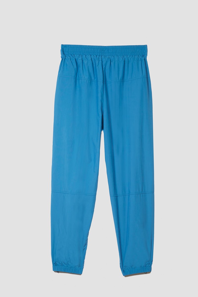 The Track-Less Pant-blue #1 The Track-Less Pant, Peacock blue Track-Less pants from 3.1 PHILLIP LIM featuring tapered leg, zip details, elasticated drawstring waistband, two side slit pockets, rear welt pocket and elasticated ankles.- 5