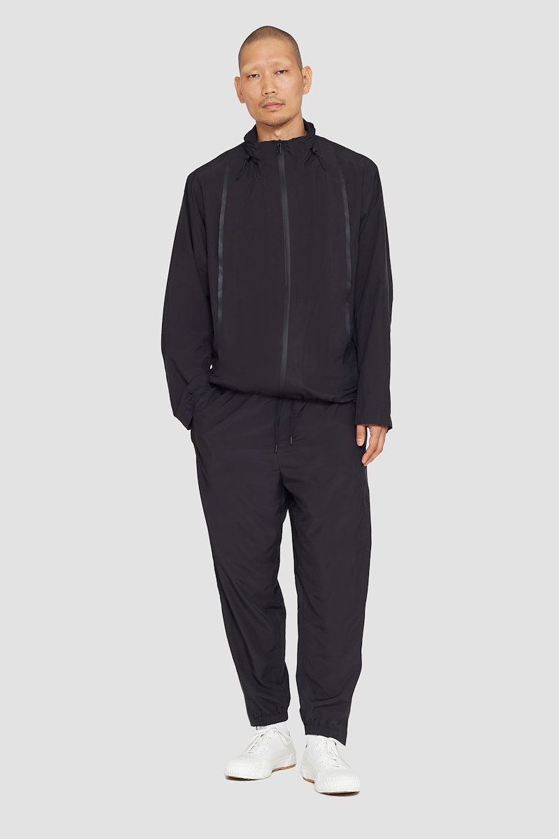 The Win-Breaker-black #0 The Win-Breaker, Black drawstring-fastening jacket from 3.1 PHILLIP LIM featuring drawstring hem, cuff zips, drawstring neck, stand-up collar, long sleeves, front zip fastening and two zip-fastening pockets.- 0