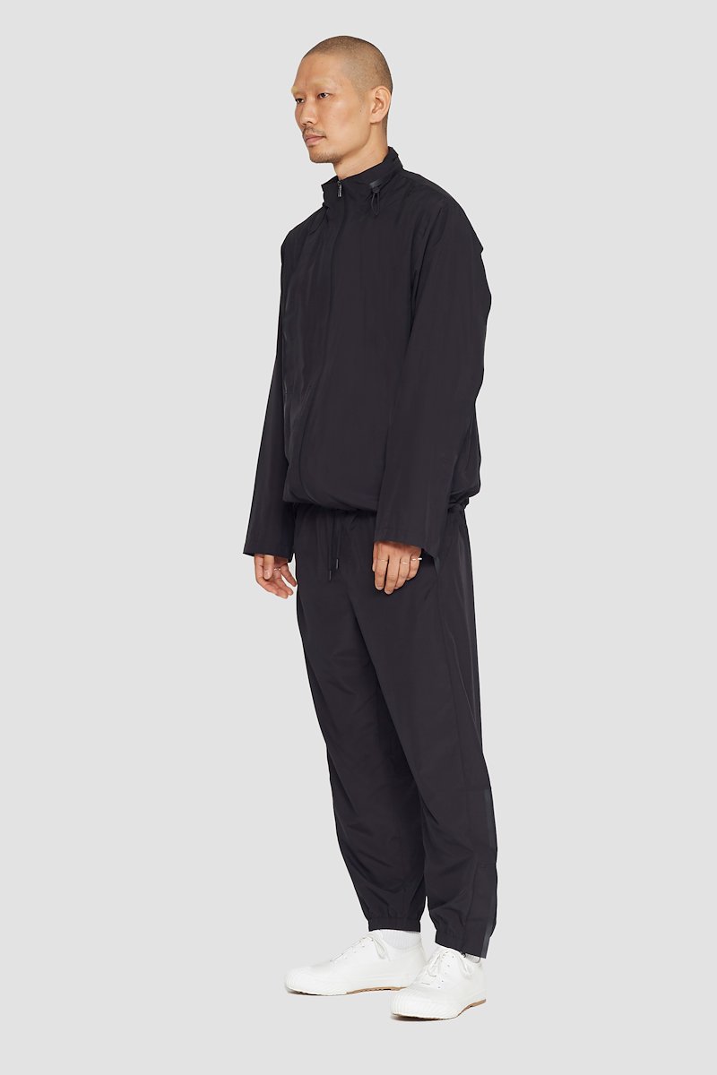 The Win-Breaker-black #1 The Win-Breaker, Black drawstring-fastening jacket from 3.1 PHILLIP LIM featuring drawstring hem, cuff zips, drawstring neck, stand-up collar, long sleeves, front zip fastening and two zip-fastening pockets.- 1