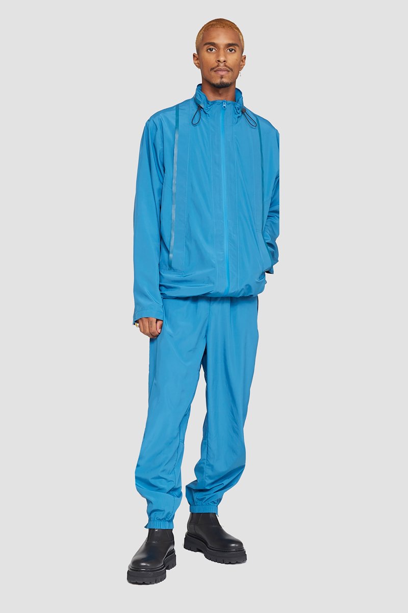 The Win-Breaker-blue #0 The Win-Breaker, Peacock blue drawstring-fastening jacket from 3.1 PHILLIP LIM featuring cuff zips, drawstring hem, drawstring neck, stand-up collar, front zip fastening, long sleeves and two zip-fastening pockets.- 0