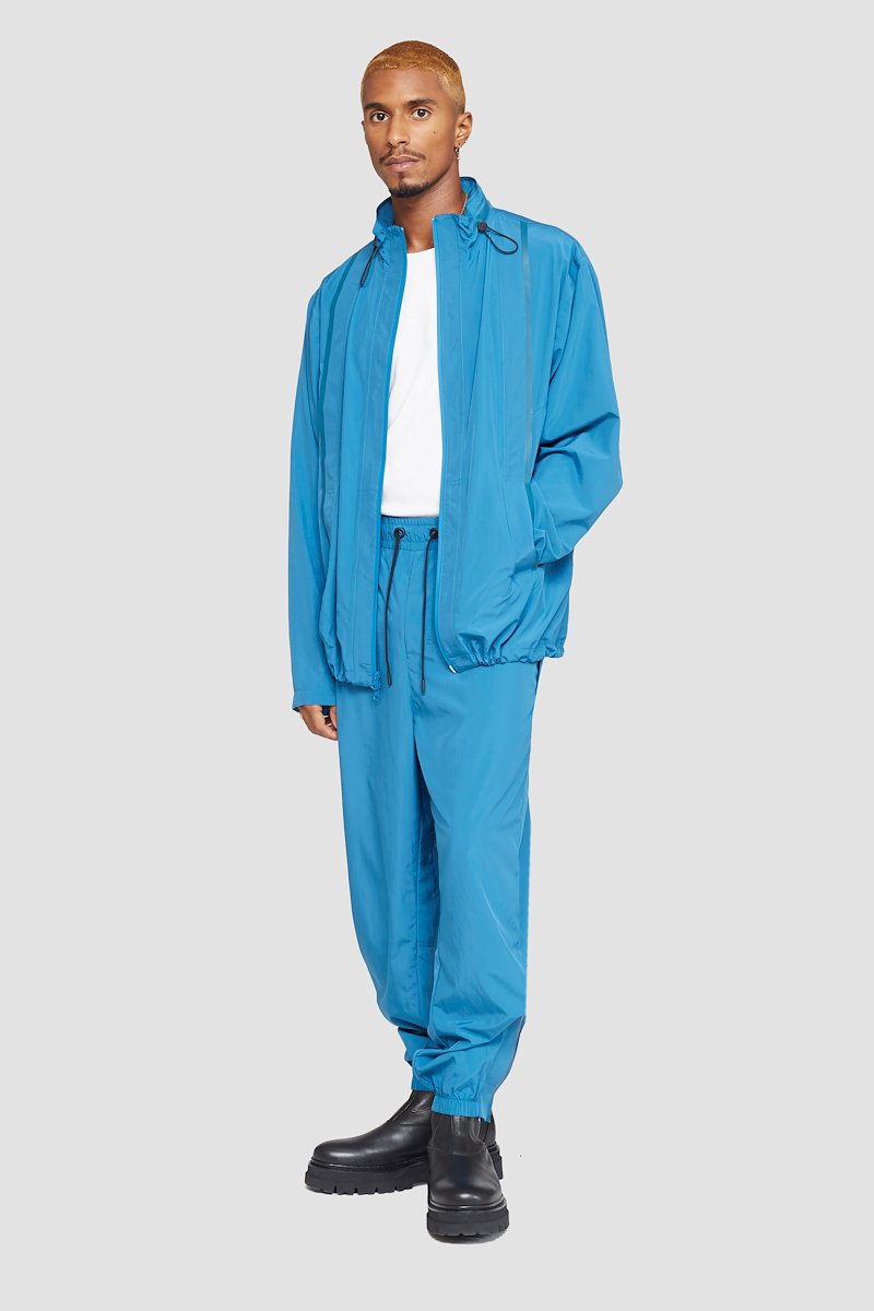 The Win-Breaker-blue #1 The Win-Breaker, Peacock blue drawstring-fastening jacket from 3.1 PHILLIP LIM featuring cuff zips, drawstring hem, drawstring neck, stand-up collar, front zip fastening, long sleeves and two zip-fastening pockets.- 3