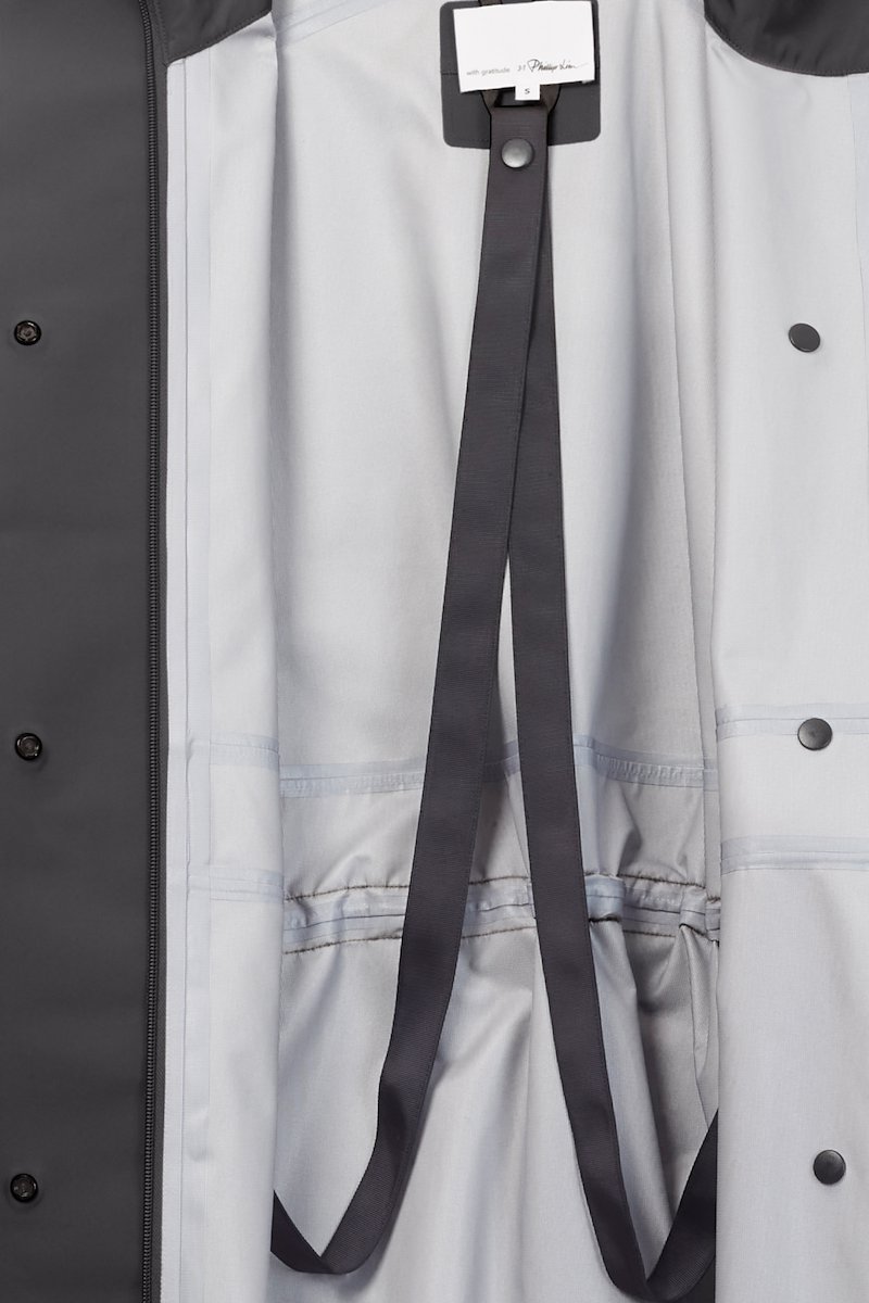 The Essential Parka-black #1 The Essential Parka, Black Essential hooded parka coat from 3.1 PHILLIP LIM featuring drawstring hood, stand-up collar, long sleeves, storm flap, drawstring waist, concealed front button fastening, wind-resistant and water-resistant.- 7