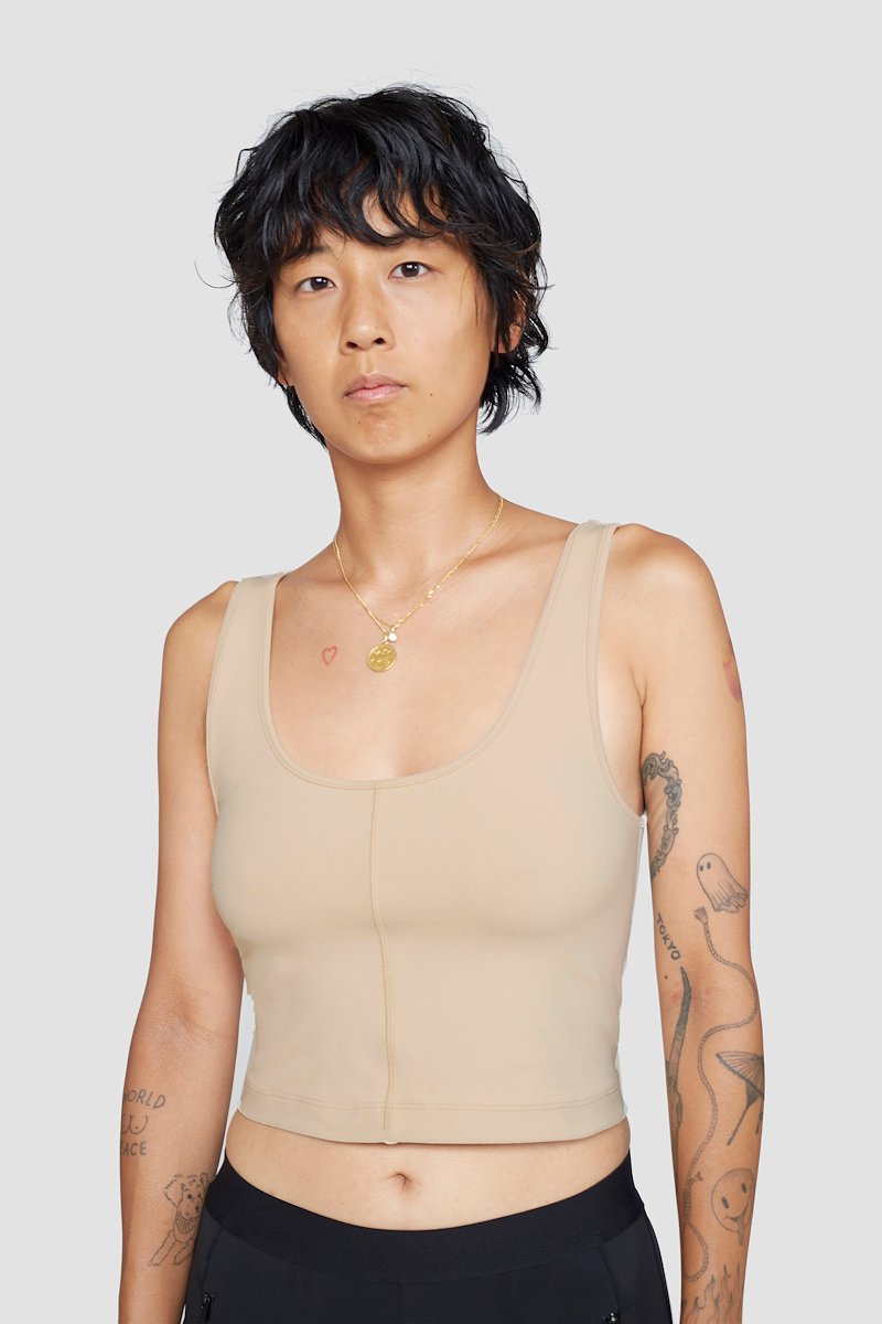 The Everyday Crop Tank-neutrals #1 The Everyday Crop Tank, Nude beige Everyday cropped tank top from 3.1 PHILLIP LIM featuring seam detailing, logo patch to the rear, scoop neck, sleeveless and cropped.- 3