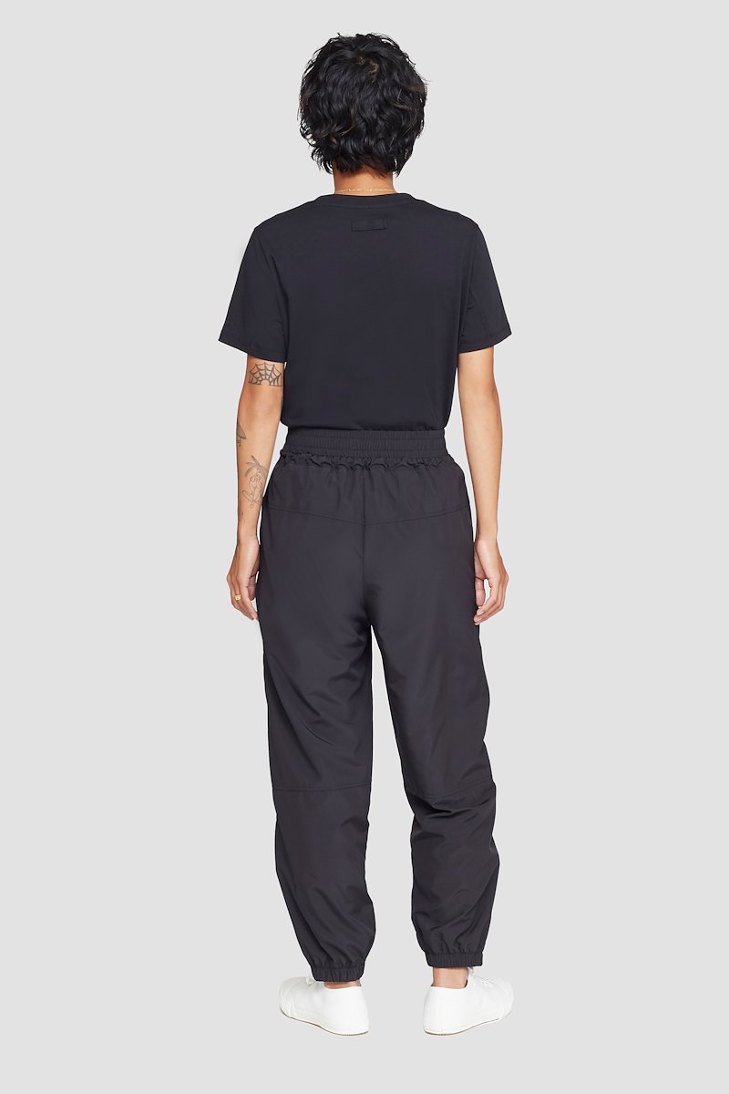 The Track-Less Pant, Black Track-less cropped track pants from 3.1 PHILLIP LIM featuring mid-rise, elasticated drawstring waistband, two side slit pockets and elasticated cuffs.- 2