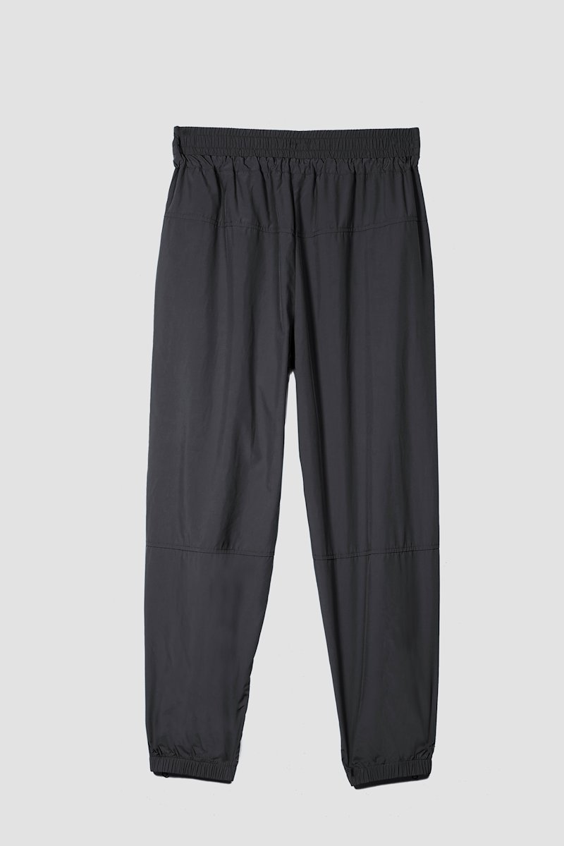 The Track-Less Pant-black #1 The Track-Less Pant, Black Track-less cropped track pants from 3.1 PHILLIP LIM featuring mid-rise, elasticated drawstring waistband, two side slit pockets and elasticated cuffs.- 5