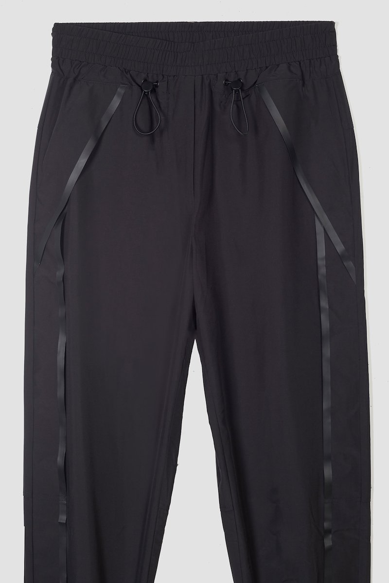 The Track-Less Pant-black #0 The Track-Less Pant, Black Track-less cropped track pants from 3.1 PHILLIP LIM featuring mid-rise, elasticated drawstring waistband, two side slit pockets and elasticated cuffs.- 6