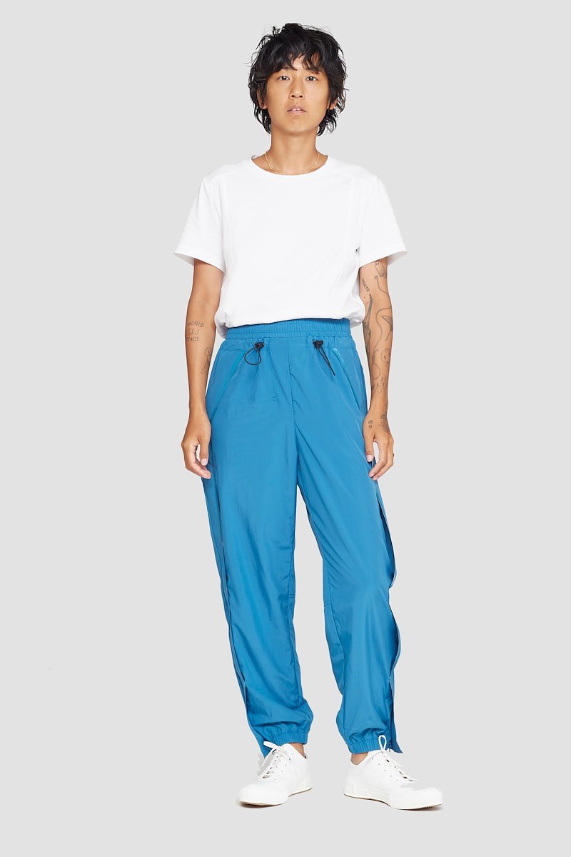 The Track-Less Pant-blue #0 The Track-Less Pant, Peacock blue Track-less cropped track pants from 3.1 PHILLIP LIM featuring mid-rise, elasticated drawstring waistband, two side slit pockets and elasticated cuffs.- 0