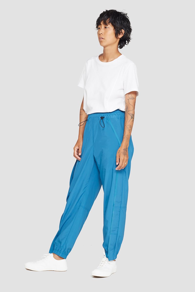 The Track-Less Pant-blue #1 The Track-Less Pant, Peacock blue Track-less cropped track pants from 3.1 PHILLIP LIM featuring mid-rise, elasticated drawstring waistband, two side slit pockets and elasticated cuffs.- 1