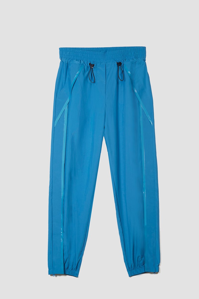 The Track-Less Pant-blue #0 The Track-Less Pant, Peacock blue Track-less cropped track pants from 3.1 PHILLIP LIM featuring mid-rise, elasticated drawstring waistband, two side slit pockets and elasticated cuffs.- 4