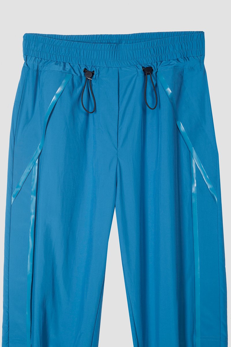 The Track-Less Pant-blue #0 The Track-Less Pant, Peacock blue Track-less cropped track pants from 3.1 PHILLIP LIM featuring mid-rise, elasticated drawstring waistband, two side slit pockets and elasticated cuffs.- 6