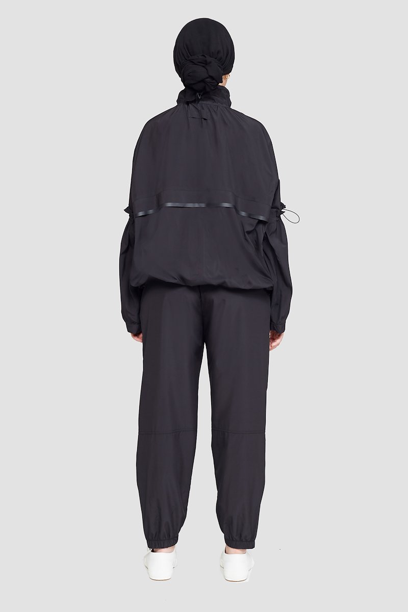 The Win-Breaker-black #0 The Win-Breaker, Black drawstring-detail jacket from 3.1 PHILLIP LIM featuring drawstring fastening, two slit pockets at the chest, buttoned-cuff sleeves, front zip fastening and long sleeves.- 2