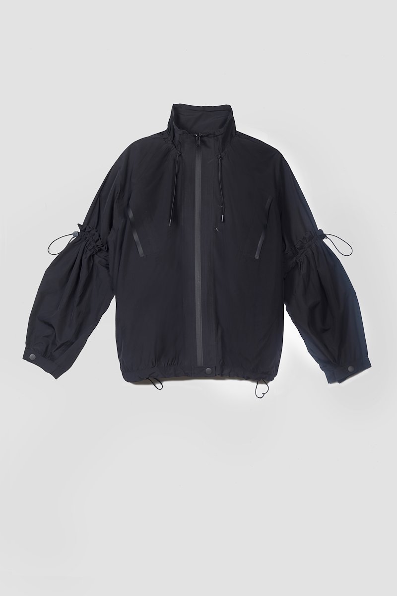 The Win-Breaker-black #1 The Win-Breaker, Black drawstring-detail jacket from 3.1 PHILLIP LIM featuring drawstring fastening, two slit pockets at the chest, buttoned-cuff sleeves, front zip fastening and long sleeves.- 3
