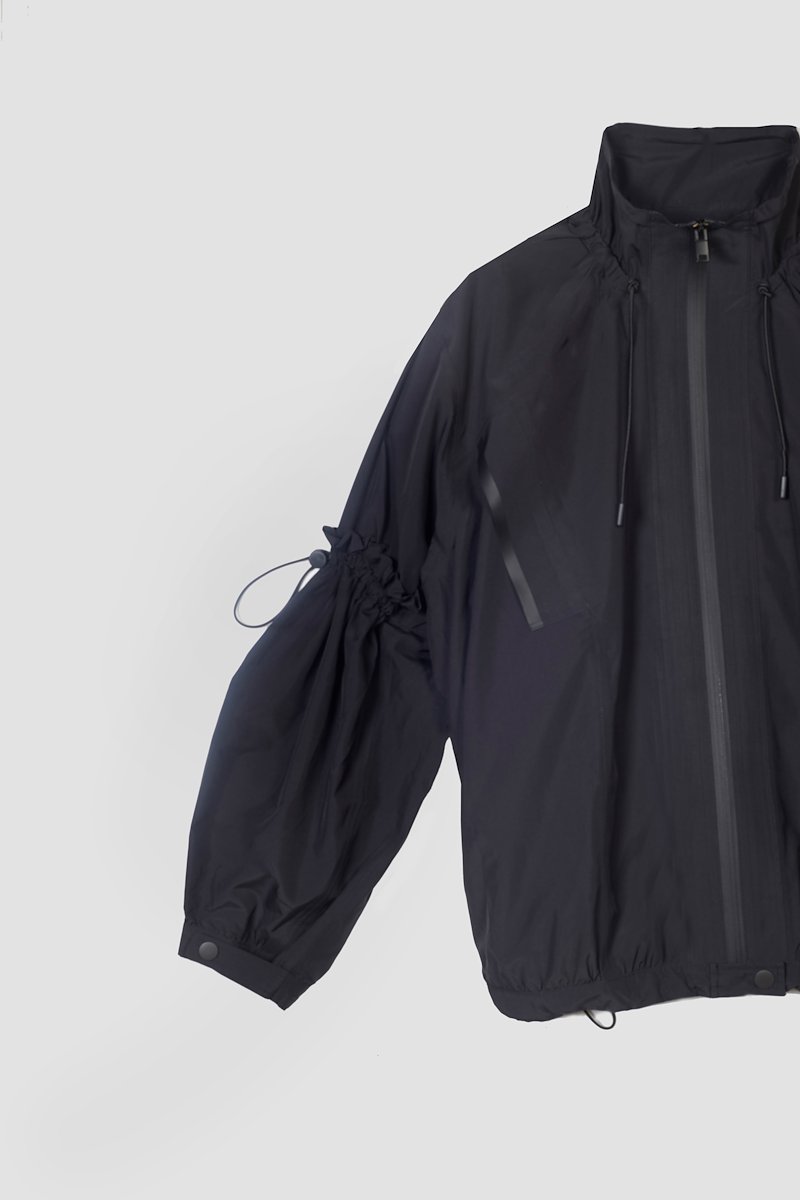 The Win-Breaker-black #1 The Win-Breaker, Black drawstring-detail jacket from 3.1 PHILLIP LIM featuring drawstring fastening, two slit pockets at the chest, buttoned-cuff sleeves, front zip fastening and long sleeves.- 5