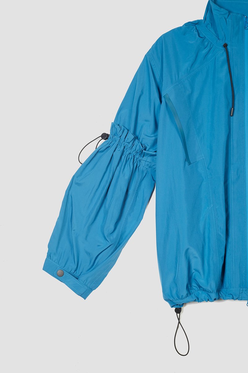 The Win-Breaker-blue #0 The Win-Breaker, Blue drawstring-detail jacket from 3.1 PHILLIP LIM featuring drawstring fastening, front zip fastening, long sleeves, buttoned cuffs and two slit pockets at the chest.- 6