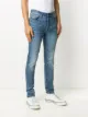 AMIRI ripped mid-rise skinny jeans