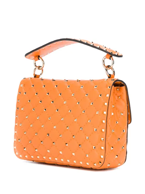 Valentino Garavani orange Rockstud Spike shoulder bag for women |  UW2B0122NAP at Farfetch.com