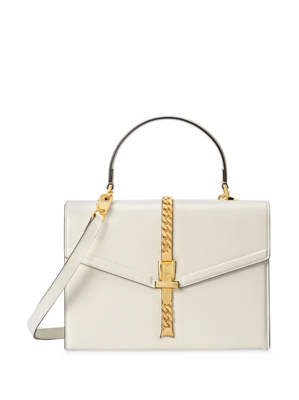gold handle bag