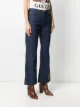 Gucci flared jeans with logo patch at leg