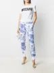 الصورة 2 من Moschino بنطال رياضي بأطراف منحنية وطبعة تصويرية